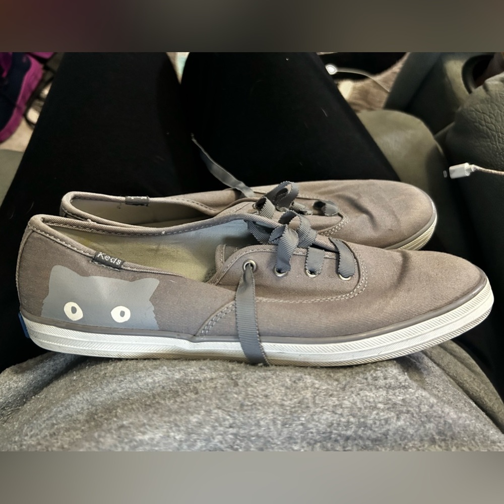 Limited Edition Taylor Swift gray Sneaky Cat sneakers.